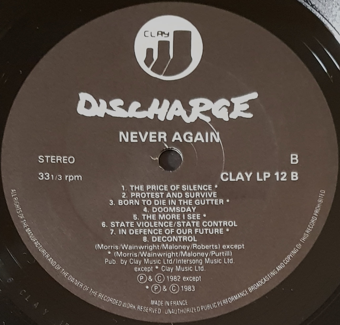 Discharge - Never Again, A Classic Clay Records LP Album